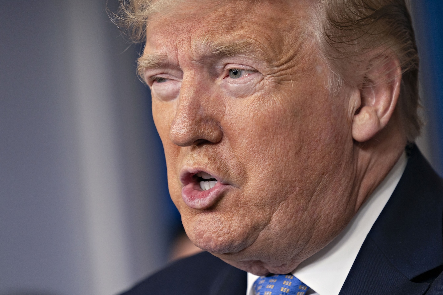 President Trump speaks about the coronavirus during a news conference at the White House on Sunday, (Chris Kleponis/Bloomberg)