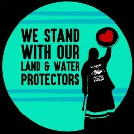 WE STAND WITH OUR LAND AND WATER PROTECTORS